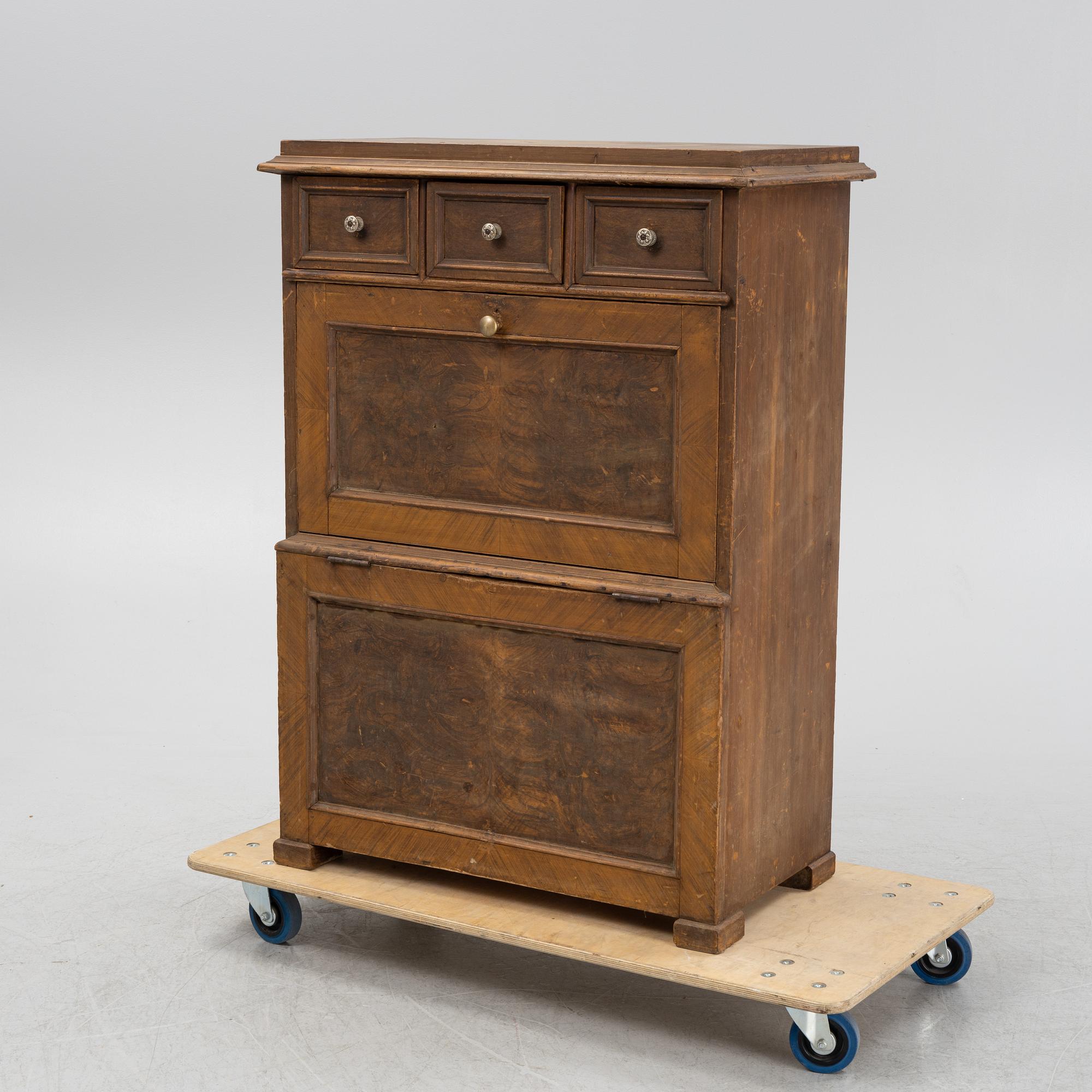 A wooden fire wood box, around 1900.