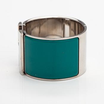 Hermès, A "H click" bracelet made of metal and enamel. Marked Hermès, S, Made in France.