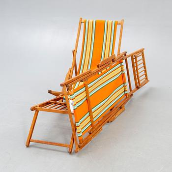 Sun loungers, a pair of footstools, 1950s.