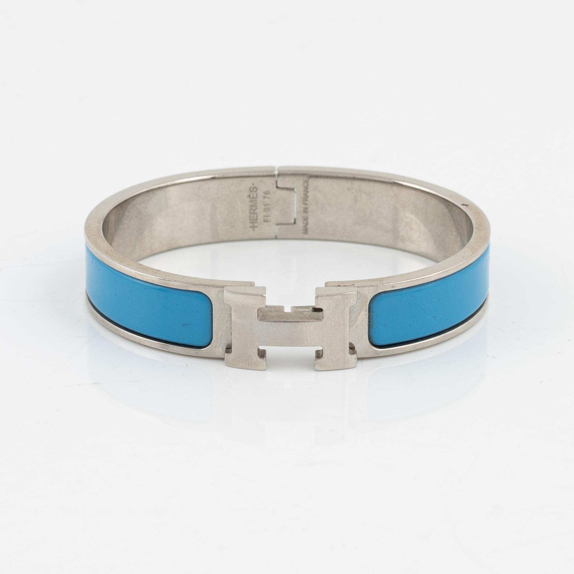 Hermès, a 'Clic H' bracelet.