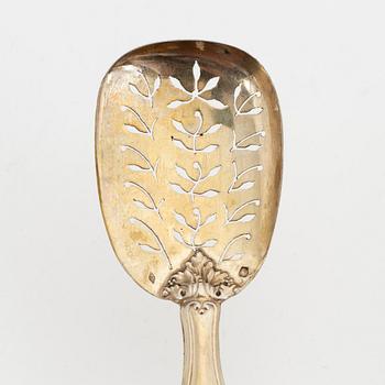 A set of four silver-gilt dessert cutlery, french export mark of Emile Huignard, late 19th century.