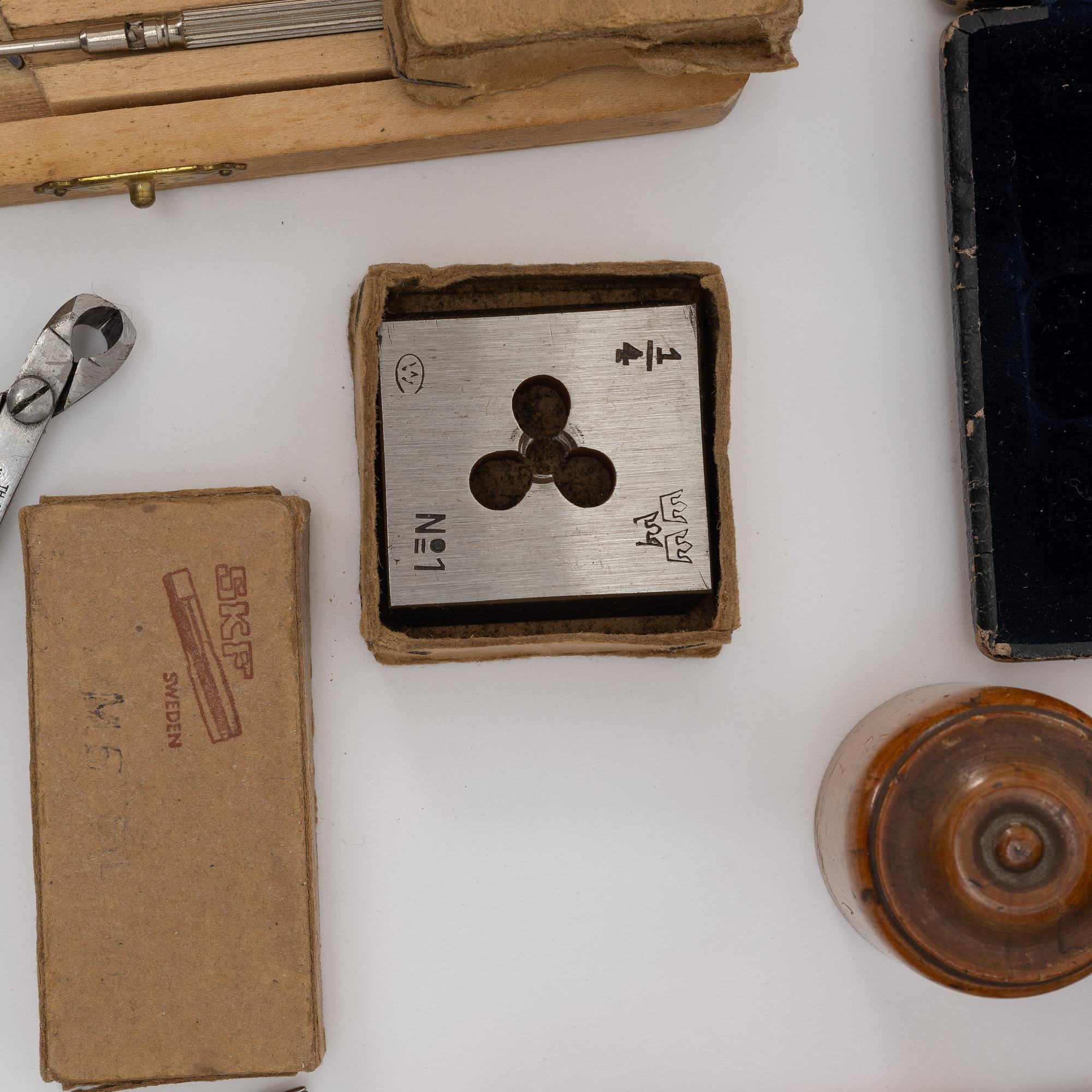 Watchmaking tools and spare parts, including a lathe by Lorch.