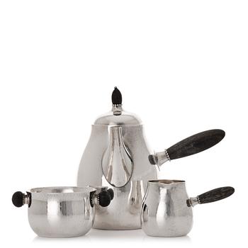 156. Georg Jensen, a set of three pieces of sterling coffee service, Copenhagen 1925-44 (the sugar bowl 1925-33), design nr 80 A and B.