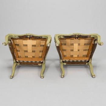 A pair of 20th century  Rococo style armchairs.