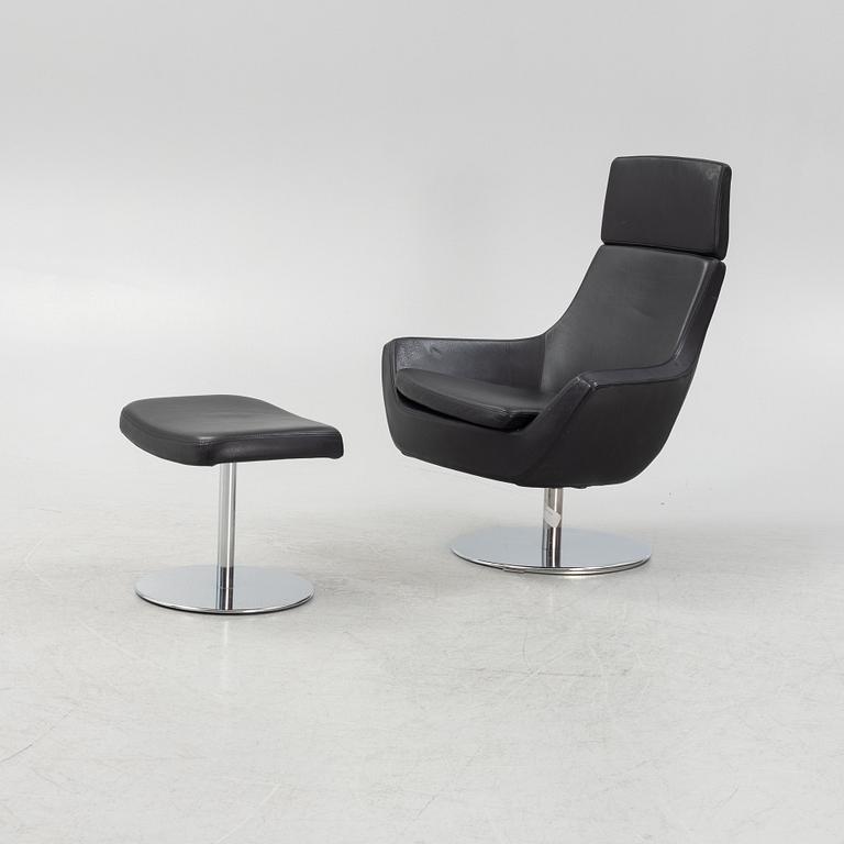 Roger Persson, a 'Happy Swing' armchair and a foot stool, Swedese, 21st Century.