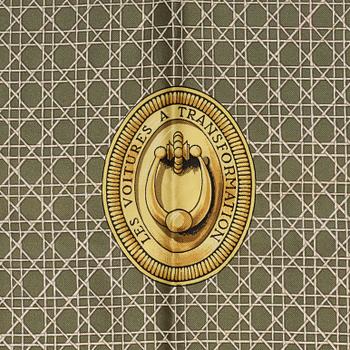 Hermès, a 'Les Voitures a Transformation' silk scarf.