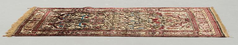 A RUG, a semi-antique silk Kashan relief (souf), ca 202 x 130,5-133 cm.