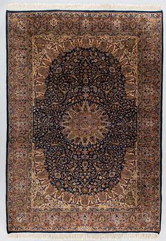 A signed rug, oriental, ca. 242 x 168 cm.