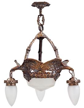 569. An Art Nouveau patinated brass chandelier, attributed to Alice Nordin, Böhlmarks, Stockholm 1910's-20's.