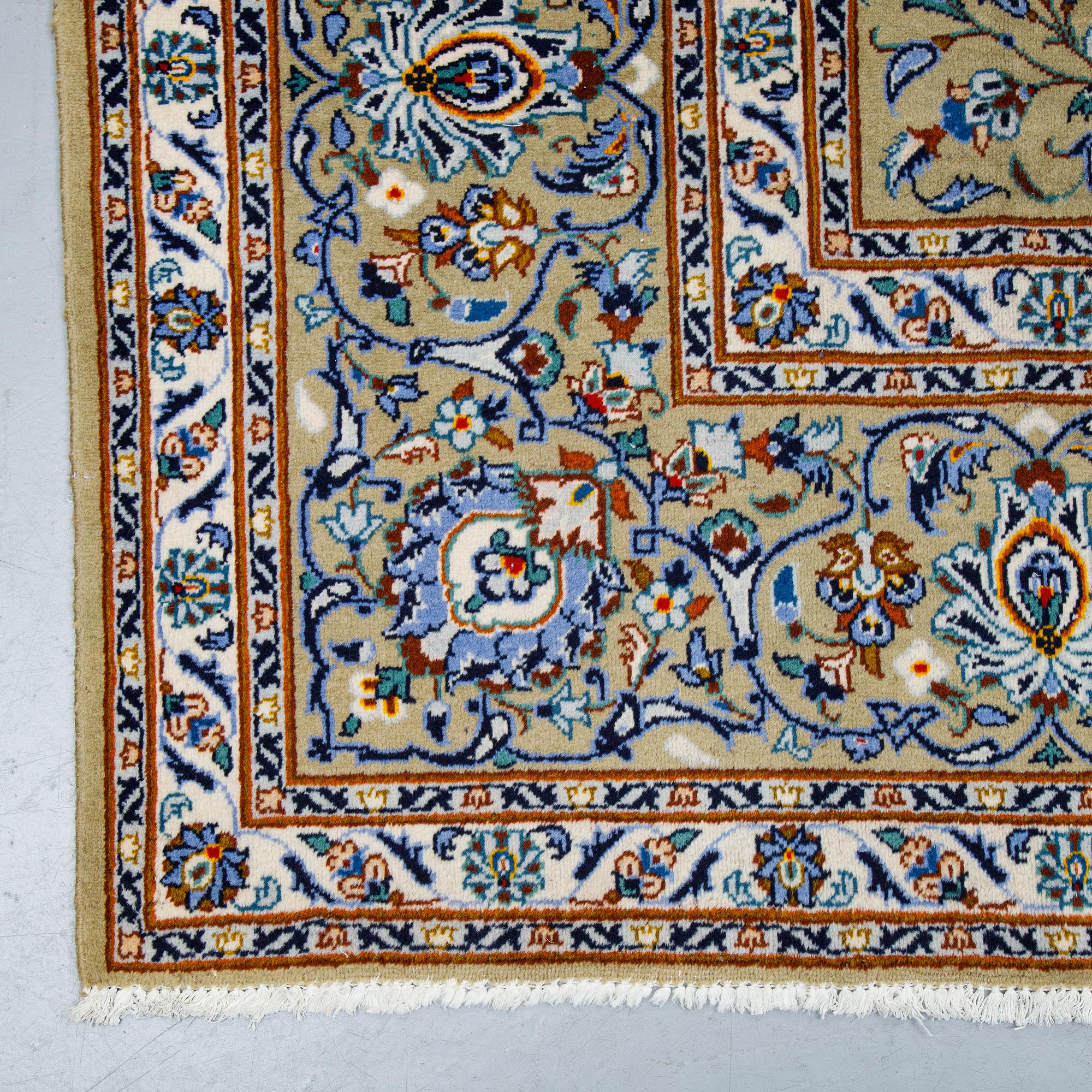 A carpet, Kashan signed, Janghair, ca 363 x 260 cm.