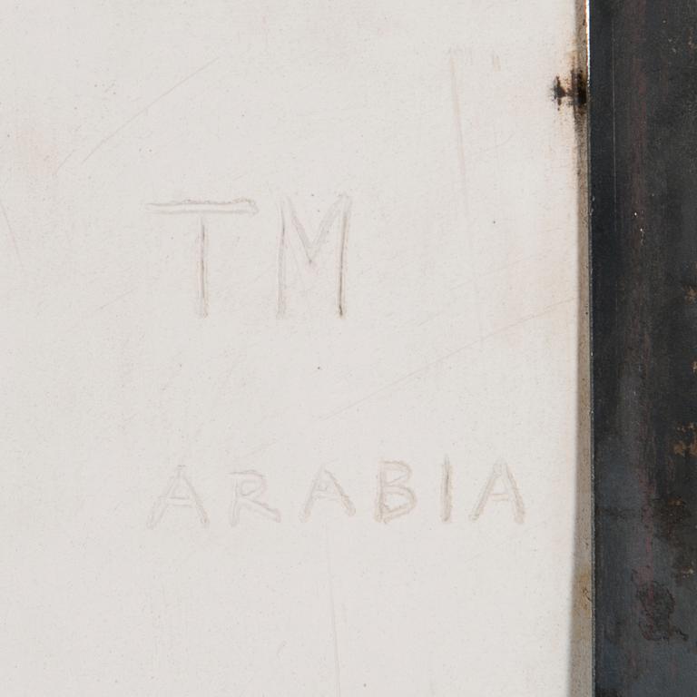 TOINI MUONA, A stoneware relief signed TM Arabia.