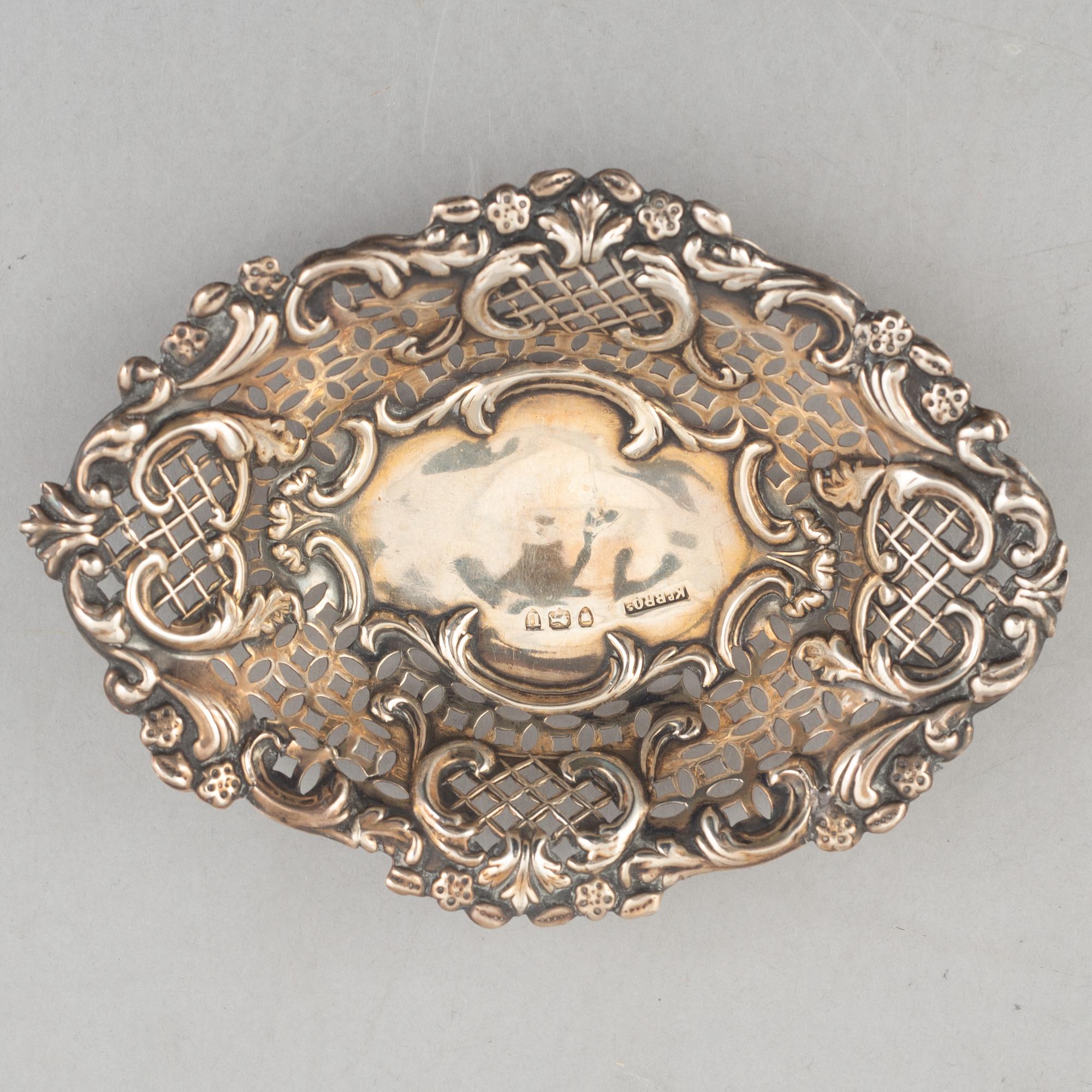 A set of five silver items, including Kemp Brothers, London, England 1895.