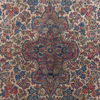 A semi-antique Kerman carpet, c. 273 x 172 cm.
