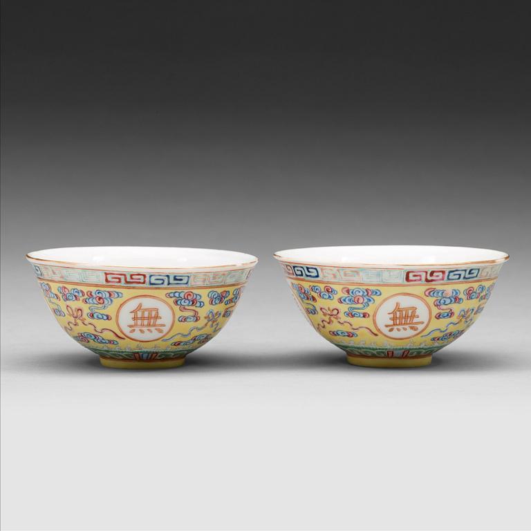 A pair of yellow ground “birthday” bowls, late Qing dynasty with Qianlong four character mark in red.