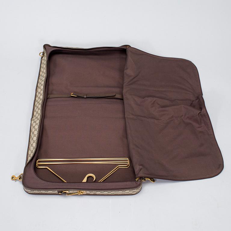 Gucci, a 'Savoy' garment bag.