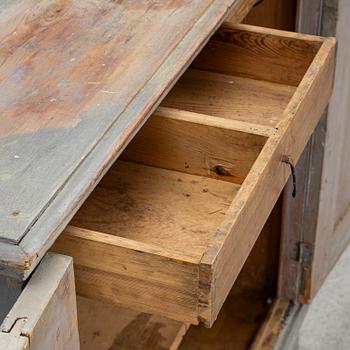 A Gustavian cupboard, circa 1800.