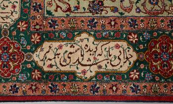 A carpet, semi-antique Tabriz, signed ca 335,5 x 256,5 - 261,5 cm.