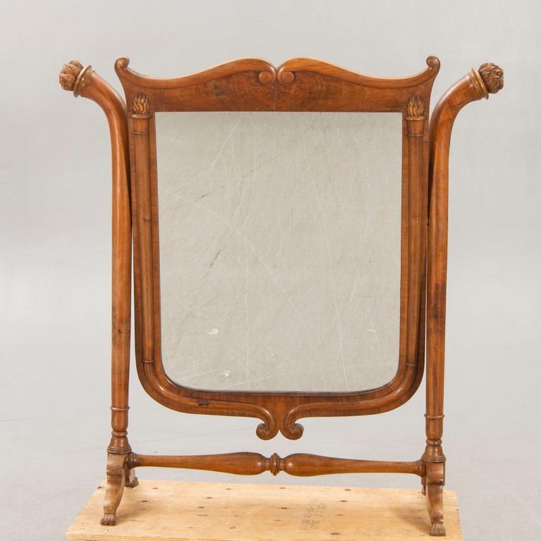 A late 19th century walnut floor mirror.