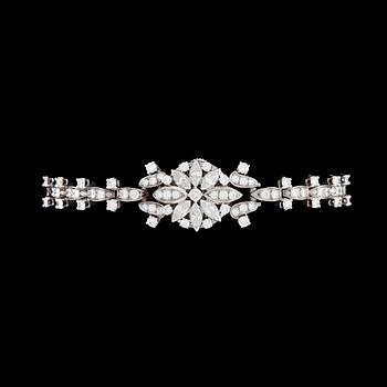 266. LADIES WRIST WATCH, Gübelin, brilliant and marquise cut diamonds, tot. 3.68 cts, 1960's.