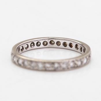 An 18K white gold eternity ring with brilliant-cut diamonds totalling approximately 0.60 ct.