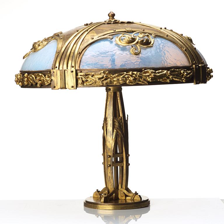 An Art Nouveau bronze table lamp, early 20th century.