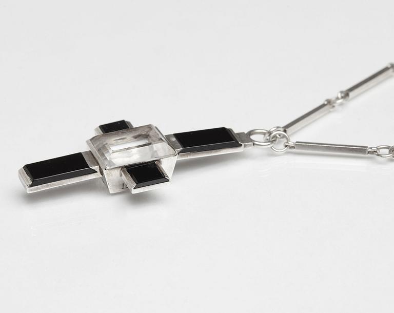 Wiwen Nilsson, a crucifix pendant and chain, sterling silver with facet cut rock crystal and onyx, Lund, Sweden 1935.