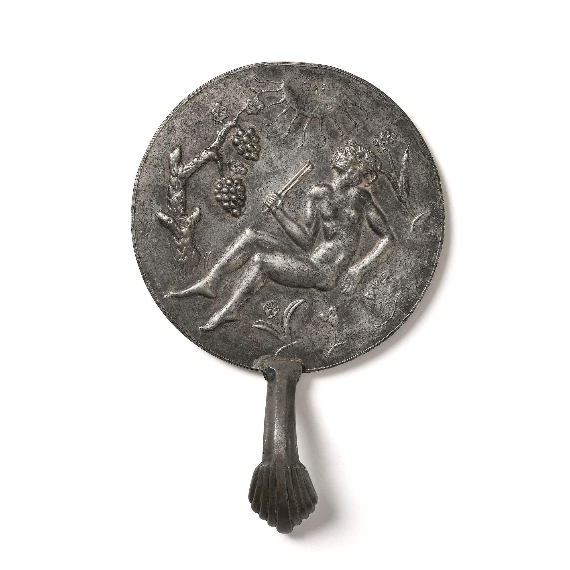 Nils Fougstedt, a pewter hand mirror model A 508, Firma Svenskt Tenn, Stockholm, 1920s-30s.