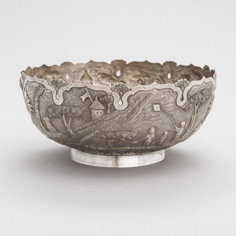 A repoussé silver bowl, mid-20th century.