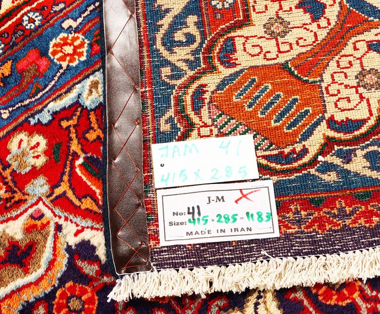 A Kashmar carpet, c. 415 x 285 cm.