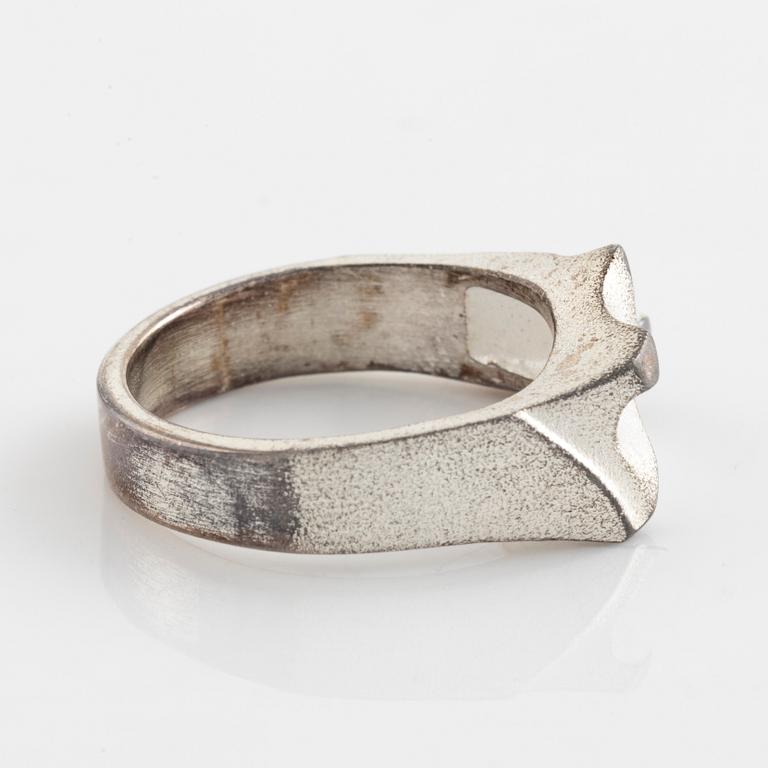 Lapponia, two sterling silver rings and tie ping.