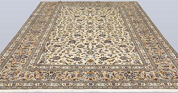 A Keshan carpet, 345 x 246 cm.