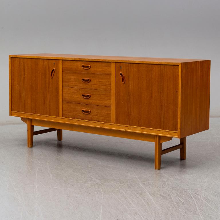 A 1950/60s teak veneered sideboard.