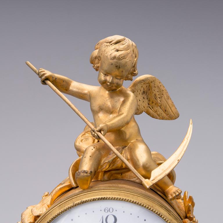A neoclassical, French mantel clock, ca 1840-1860.