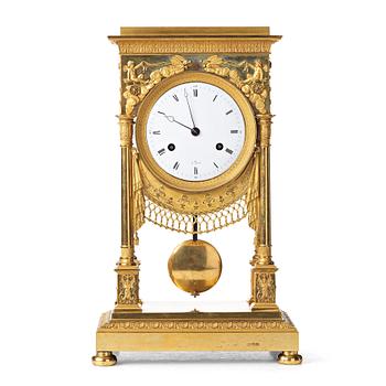 137. A French early 19th century mantel clock.