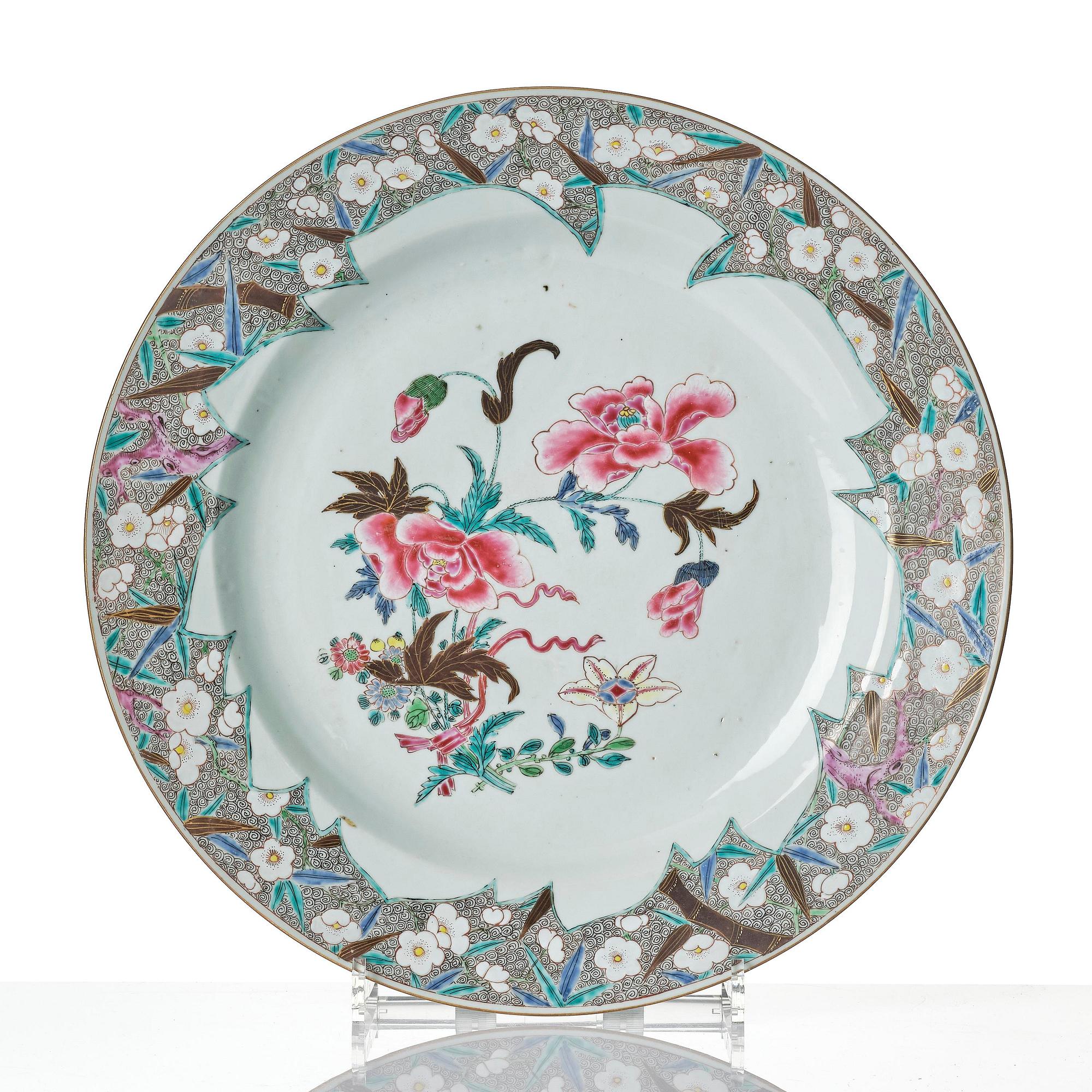 A famille rose serving dish and six dinner plates, Qing dynasty, Qianlong (1736-95).