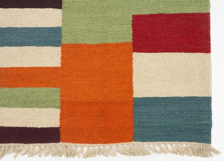 A Kilim runner, c. 388 x 80 cm.