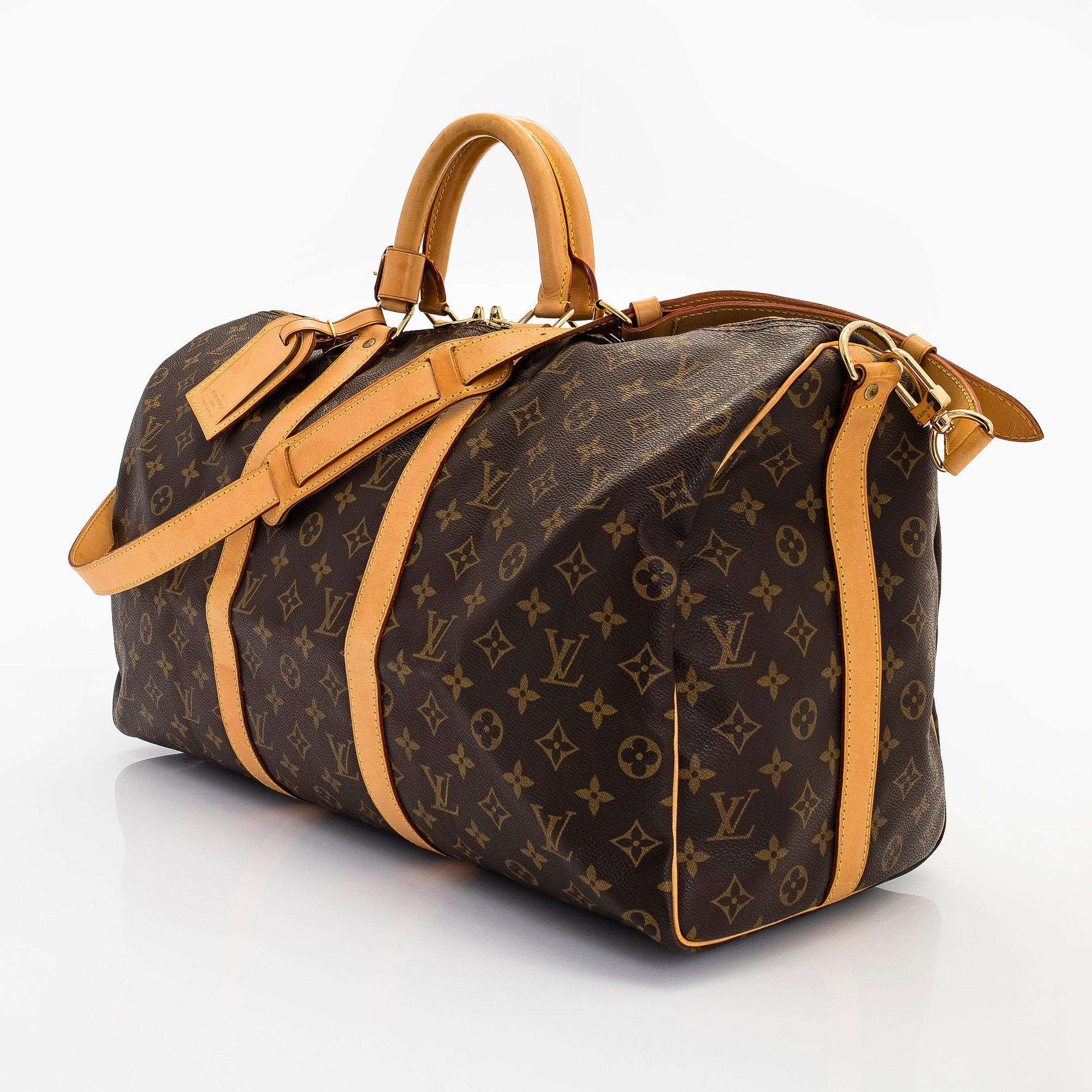 Louis Vuitton, a Monogram Canvas 'Keepall 55 Bandouliere' bag.