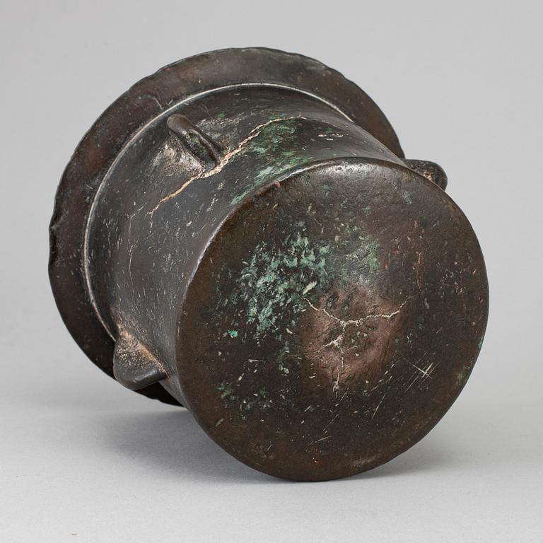 A 15th century bronze mortar.