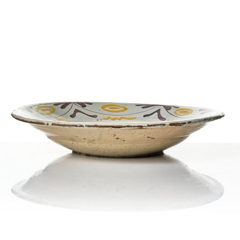 A group of three faience dishes, 18th century.