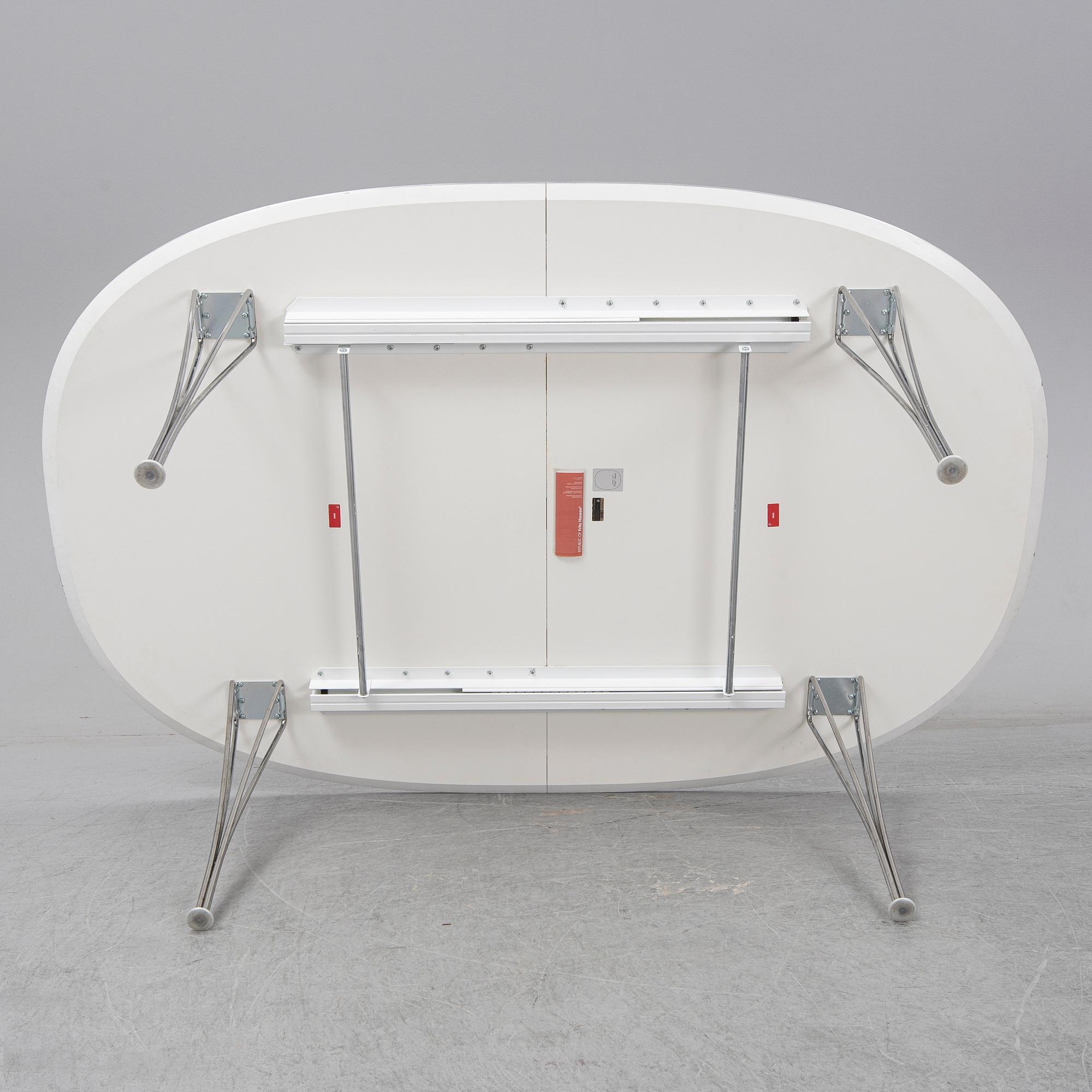 BRUNO MATHSSON & PIET HEIN, a 'Superellips' dining table, Fritz Hansen, Denmark.