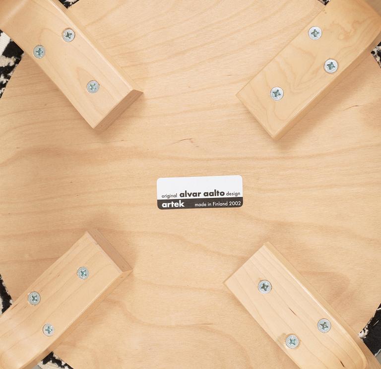 A pair of Alvar Aalto stools for Artek, Finland 2002.