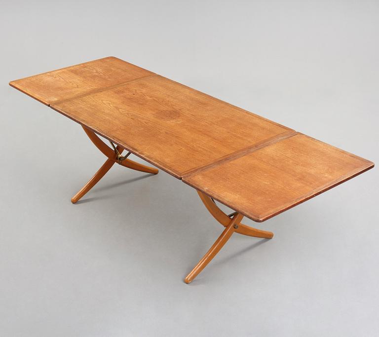 Hans J. Wegner, a teak and beech dinner table by Andreas Tuck, Denmark 1950-60's.