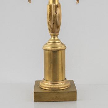 A pair of brass candelabra, first half/mid 19th century.