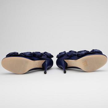 LOUIS VUITTON, a pair of purple leather lady's shoes.