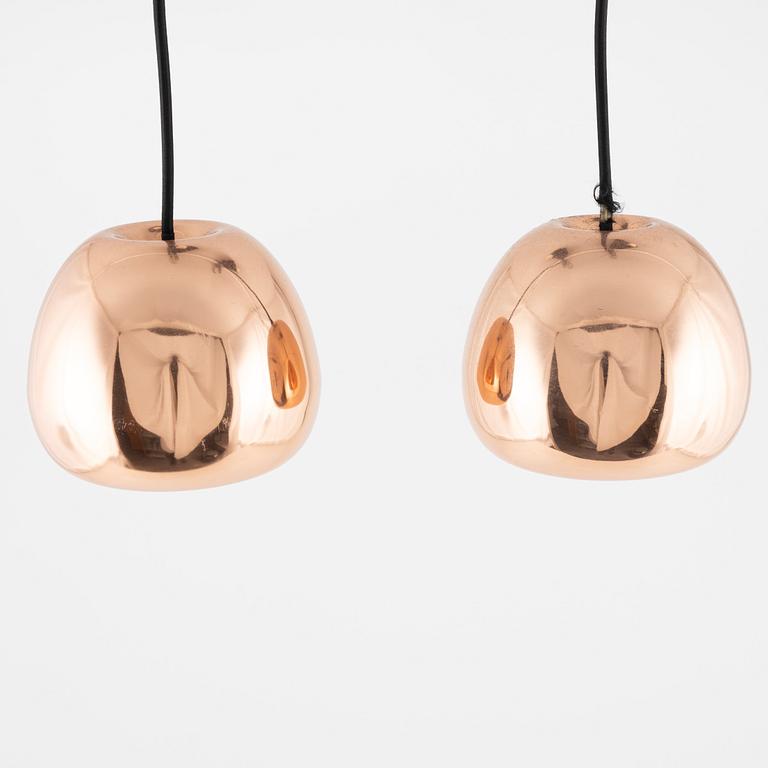 A pair of copper ceiling lamps, 'void Mini Pendant', Tom Dixon.