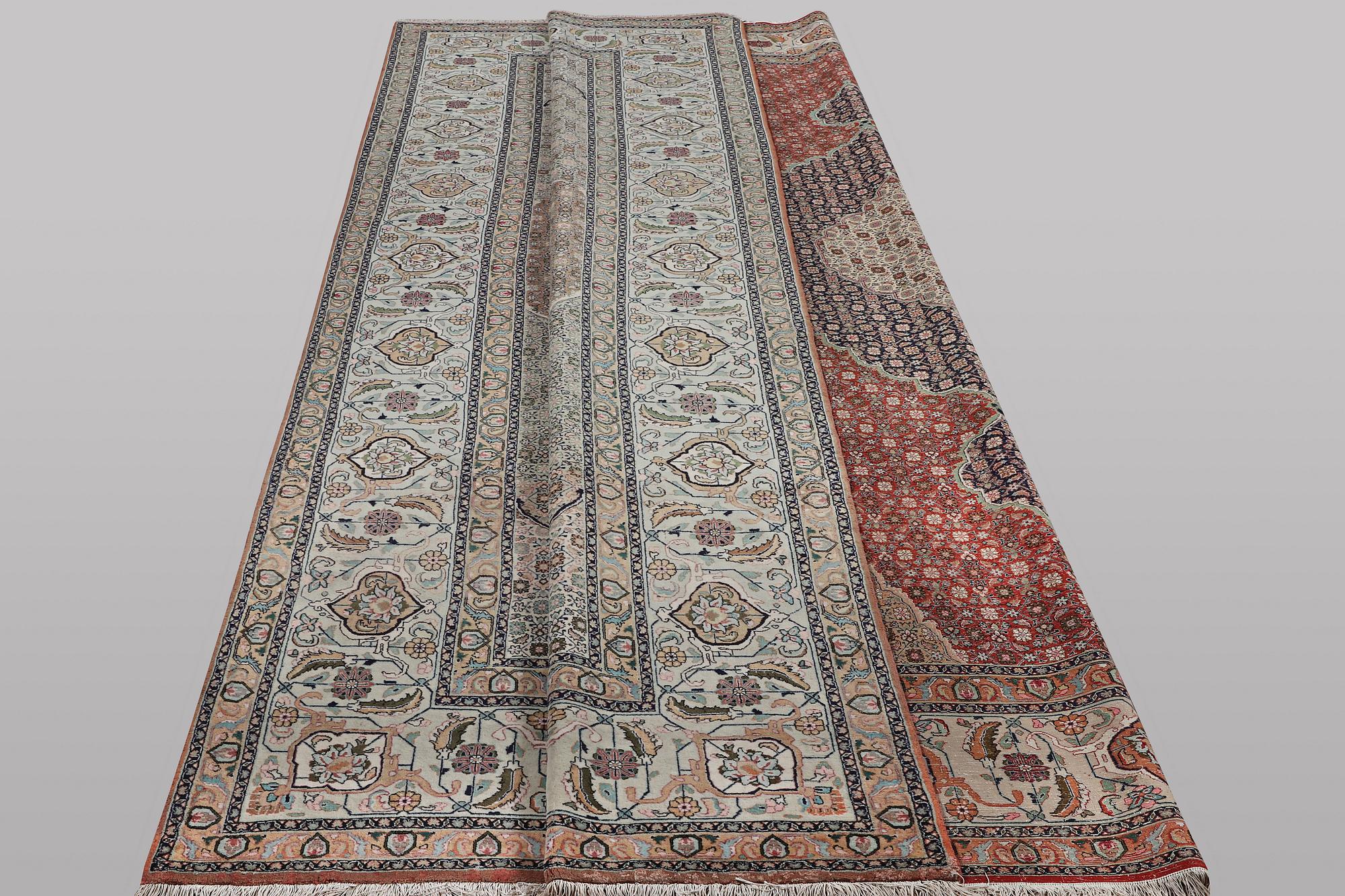 A carpet, Tabriz, part silk, 50 raj, ca 414 x 300 cm.