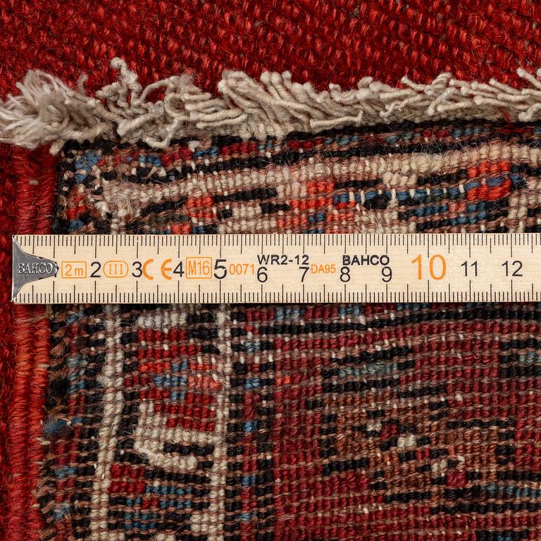 A Malayer runner, west Persia, c. 560 x 200 cm.