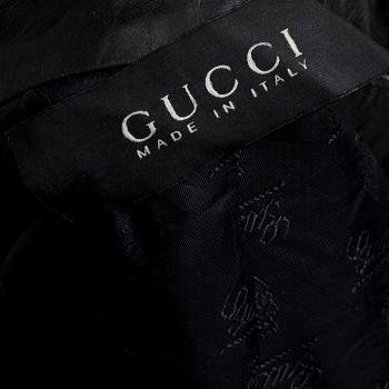 a leather jacket by Gucci, italian size 40.