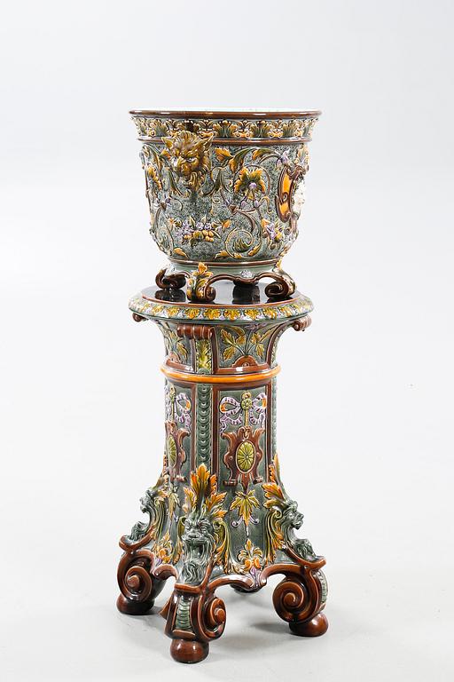 A pot on a pedestal in ceramics made by Rörstrand in the years between 1884-1890.