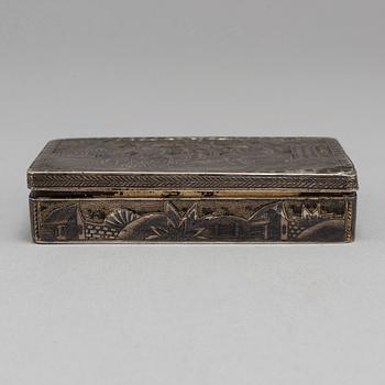 A Russian mid 19th century silver-gilt and niello snuff-box, mark of Moscow.
